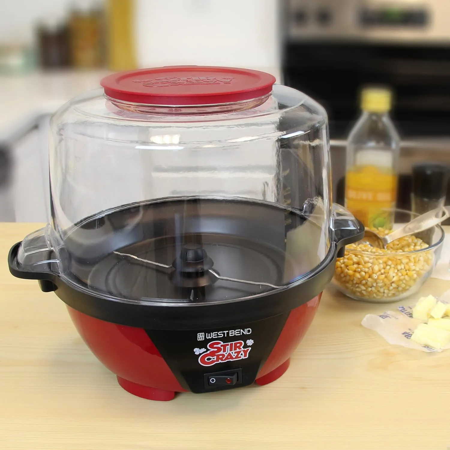 West Bend Stir Crazy Hot Oil Popcorn Popper, Popcorn Maker Machine with Large Serving Bowl Lid and Stirring Rod Perfect for Movie Night Snack Time or Parties, 6-Quart, Red